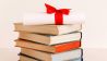 Bücher und Gutschein, Bild: imago images/Oleksandr Latk