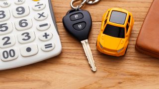 Auto und Taschenrechner, Foto: Colourbox