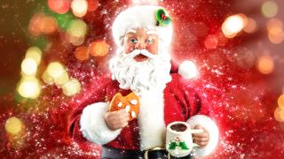 Weihnachtsmann mit Keks und Tee, Foto: colourbox